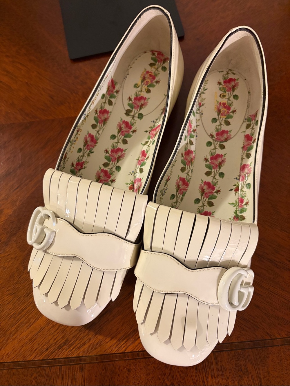 Authentic Gucci GG Marmont loafers in ivory patent leather, size 37.5